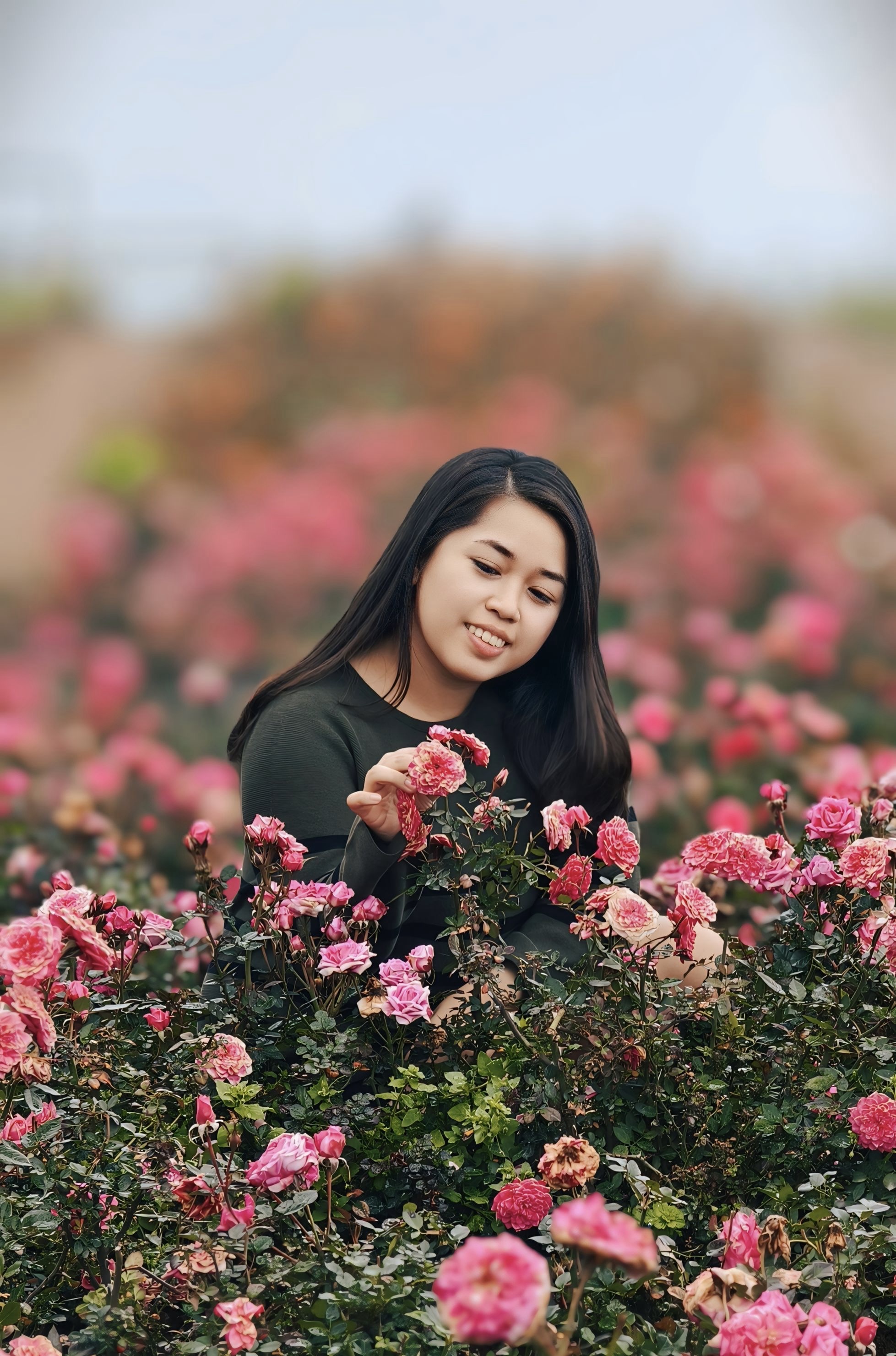 Lara in a flower garden